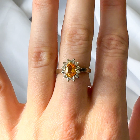 Orange Sapphire and Diamond Halo Ring