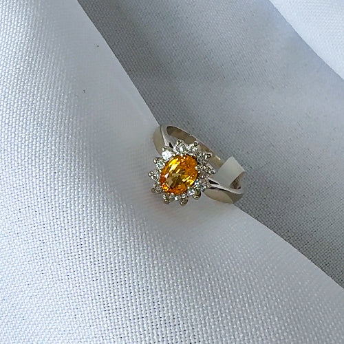 Orange Sapphire and Diamond Halo Ring
